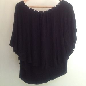 Flowing black top with studded collar