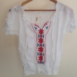 White embroidered top.