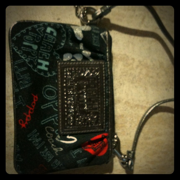 Never used cute Coach wristlet!