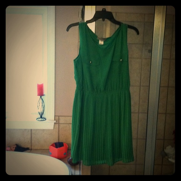 Beautiful pleated skirt money green dress.