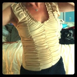 Tan, ruched top, size large, runs small.