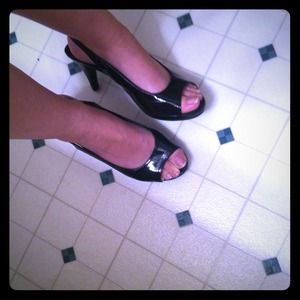 Black slingback heels.