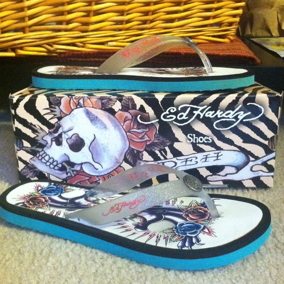 Authentic Ed Hardy Flip flops worn once.