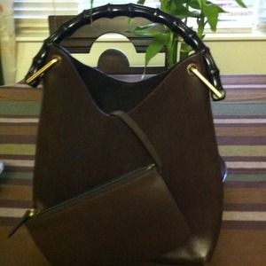 Authentic vintage gucci w/ bamboo handle...