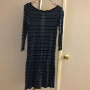 Green dress with black stripes,