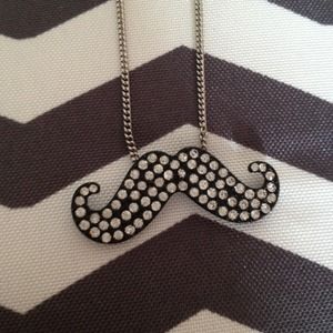 Mustache necklace.
