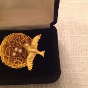 Vintage gold colored pin