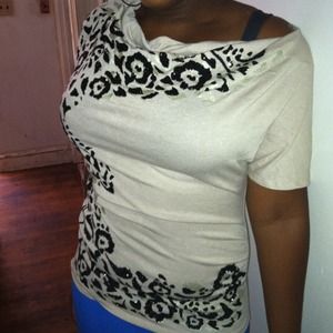 Glitzy girl off the shoulder tan top