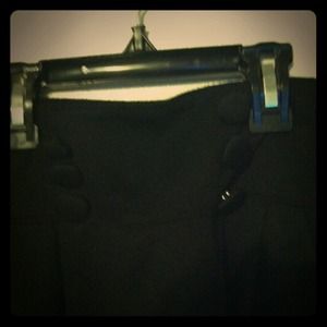 Black Minnie skirt with button details and pockets