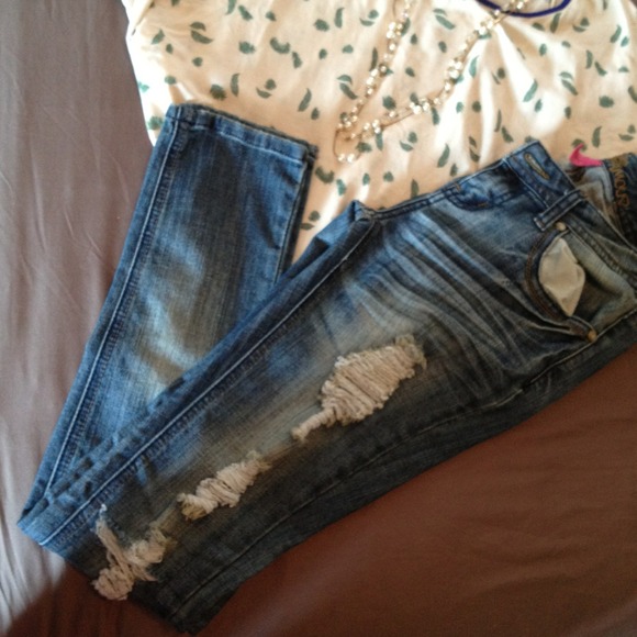 Distressed jeans.