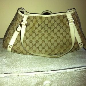 Authentic Gucci canvas shoulder bag w beige trim