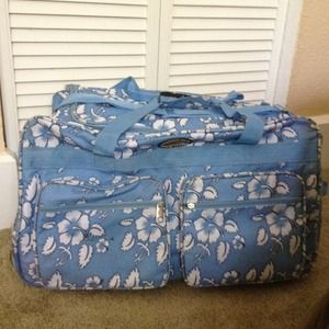 Blue rolling duffle bag