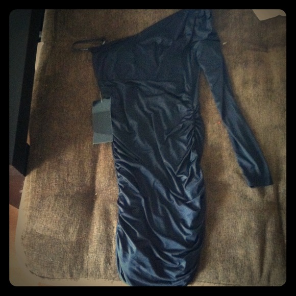 One shoulder black dress. Slits on back. Tags on.