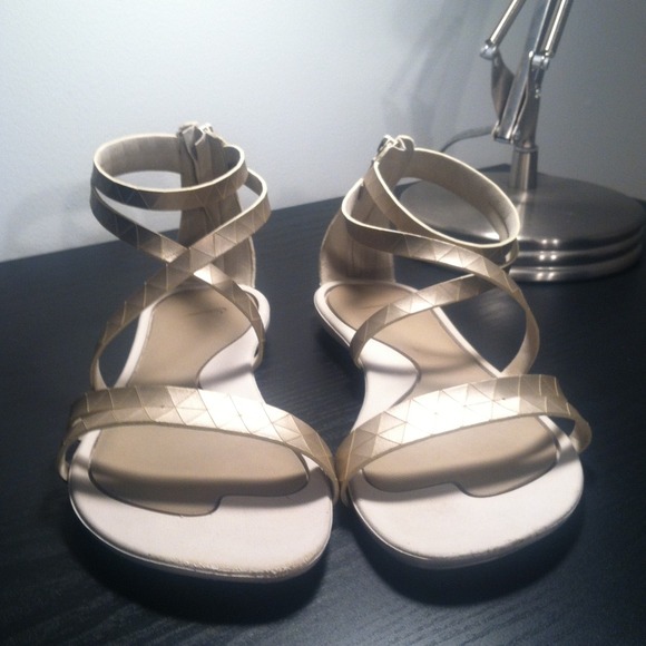 { Nike Gold Gladiator Sandals }