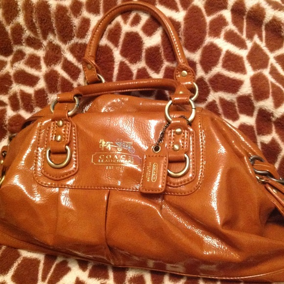 Reserved @leelee87  .Coach bag. chestnut shiny