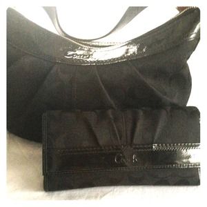 Authentic Black Coach Purse and matching Wallet.