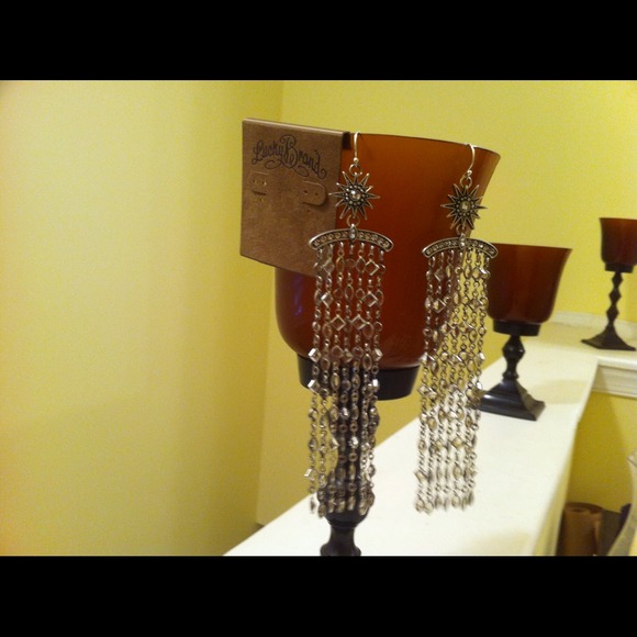 Long, dangly silver earrings