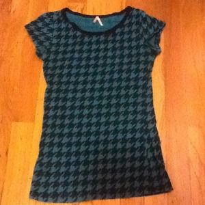 Teal and black shirt.