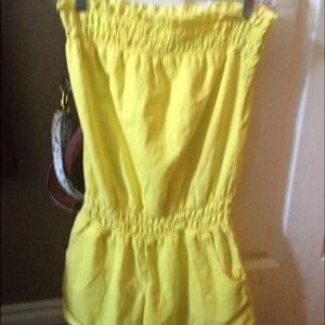 Bright yellow romper, super cute.