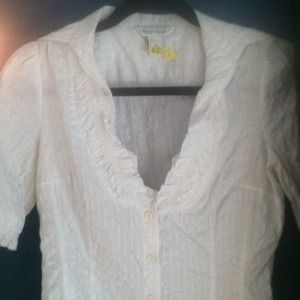White button up blouse.