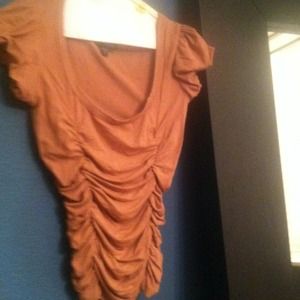 Brown top with cinched sides very flattering