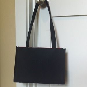 Darling black bag.  Classic and sharp.