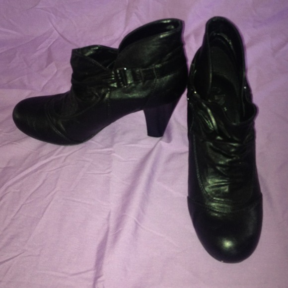 G by Guess black synthetic booties.