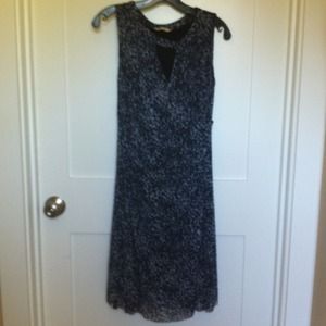 Navy animal print sleeveless dress.