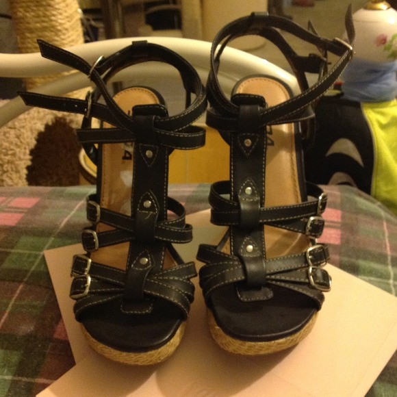 Black strappy sandals with basket weave wedge