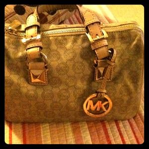 A small Michael Kors purse