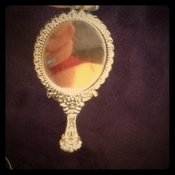 Small mirror necklace charm.