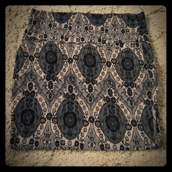 ::sold::Lace patterened skirt with vintage rose