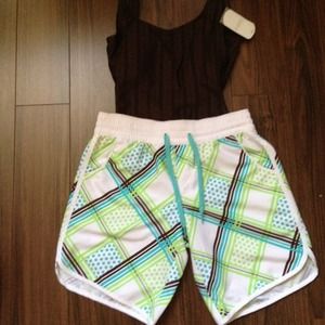 Brown Swimsuit and Board Shorts.