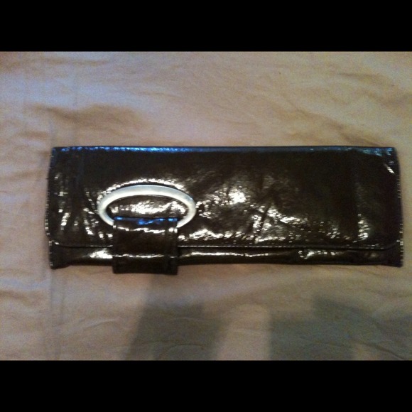 Brown patent clutch snap magnetic closure. Pocket