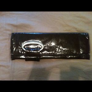 Brown patent clutch snap magnetic closure. Pocket