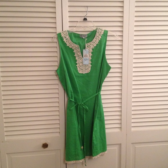 Green dress with tie and crochet neckline. NWT