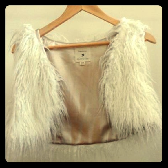 White furry vest