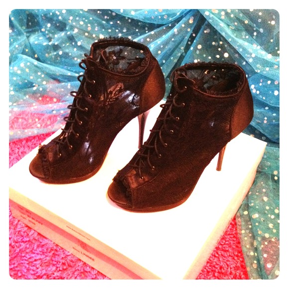 Black, lace peep-toe booties.