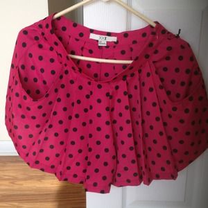 Pink shorts with black polka dots
