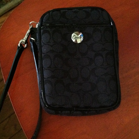 Signature coach accessory wristlet