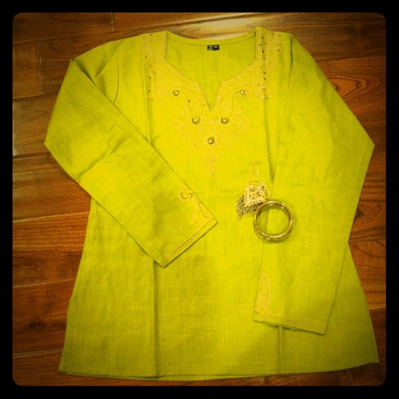 Charming green tunic with gold details from India.