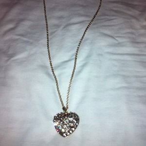 Very cute heart gold necklace!
