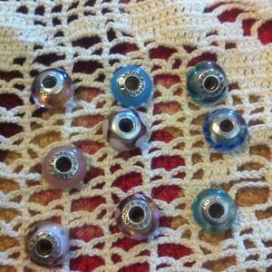Sold bundle of 9 glass Pandora beads.