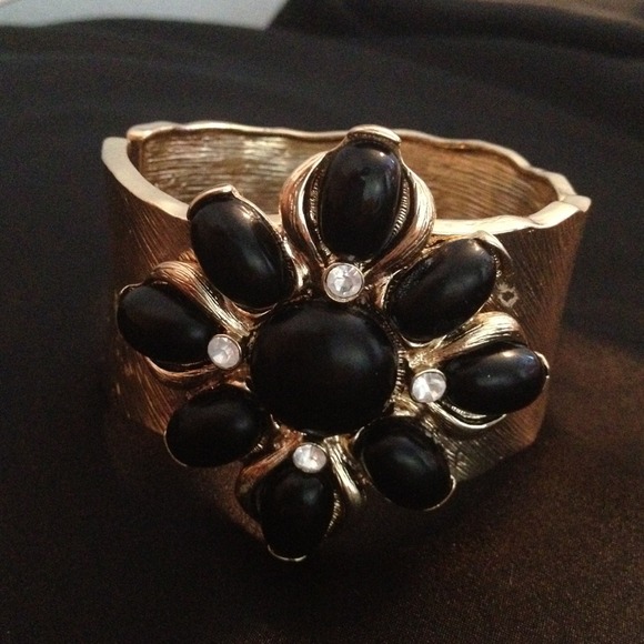 Gorgeous black and gold cuff!