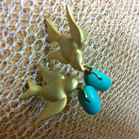 Dove earring with real turquoise.