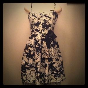 Black and white floral print formal dress .