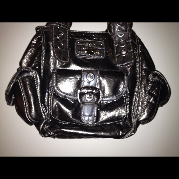 Kathy Van Zeeland Silver handbag like new