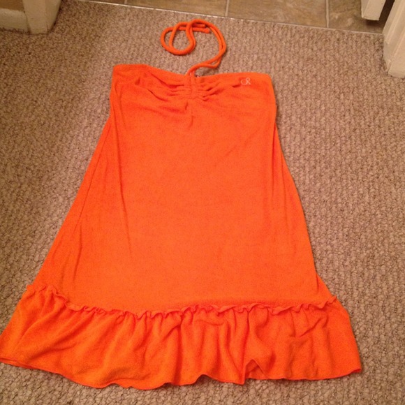 Orange swim suit cover up.