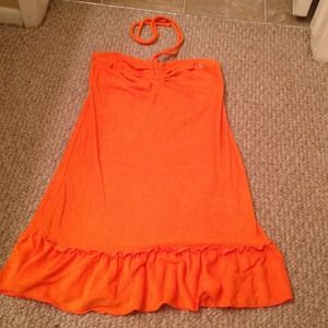 Orange swim suit cover up.