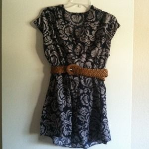 Navy blue and white floral/tribal shirt.